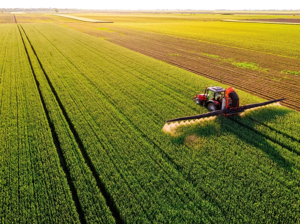 A tractor working in the fields