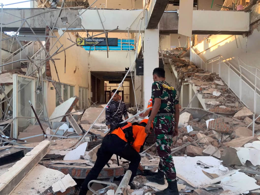 Rescuers inspect a heavily-damaged building at L. Say port following an earthquake, in Sikka, East Nusa Tenggara province, Indonesia, August 15, 2026. Indonesian Search and Rescue Agency (Basarnas)/Handout via REUTERS