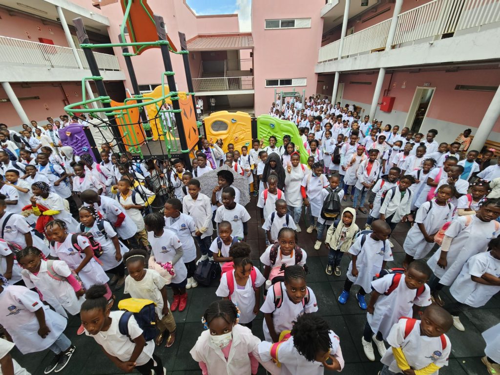 Schoolchildren gather at one of the educational facilities built and equipped by Mitrelli as part of a project supporting access to education across 13 urban communities in Angola.