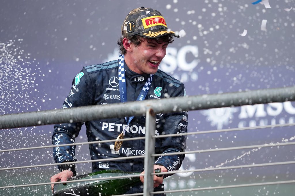 Antonelli sprays champagne on the podium after his one-stop strategy carried him to a 13-second win over Ferrari’s Charles Leclerc.