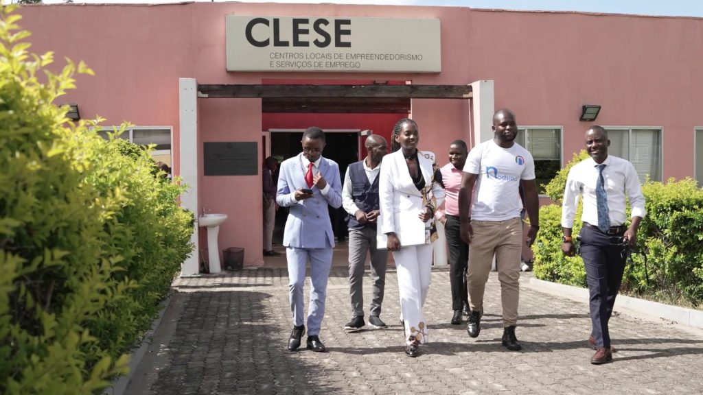 Trainees outside a CLESE Local Entrepreneurship and Employment Services Centre in Angola. The centres offer training in entrepreneurship, management and IT, as well as start-up incubation.