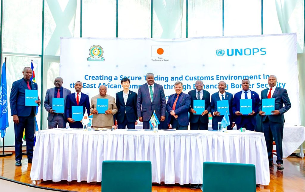 Representatives of the East African Community, the Government of Japan, UNOPS and Partner States at the handover of border patrol vehicles in Arusha, under the project Creating a Secure Trading and Customs Environment in the East African Community through Enhancing Border Security.