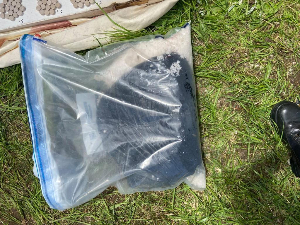 A crystalline substance suspected to be tik in an evidence bag at the Rowallan Park property. The drugs will undergo forensic testing to establish their composition.