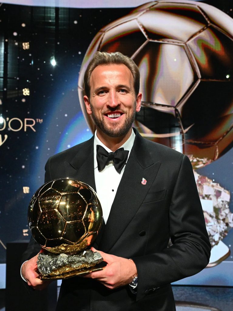Harry Kane with the 2026 Ballon d’Or after a season in which he scored 73 goals for Bayern Munich and England.