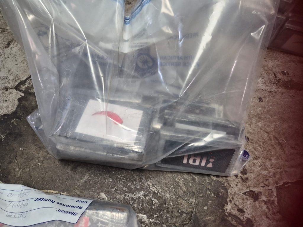 Wrapped blocks of suspected cocaine in an evidence bag at OR Tambo International Airport, where 116 drug mules have been arrested over the past 24 months.